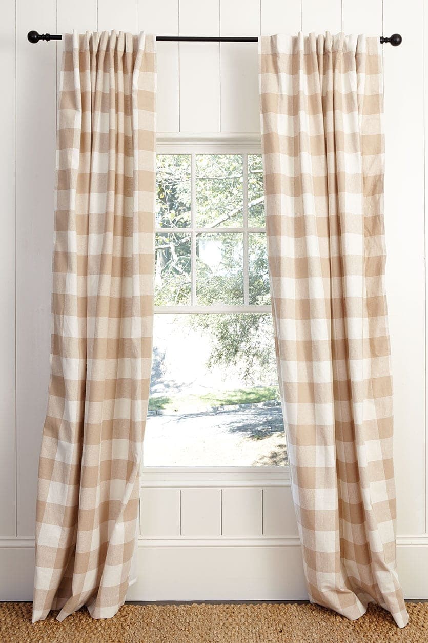 Hanging drapery panels using hidden tabs