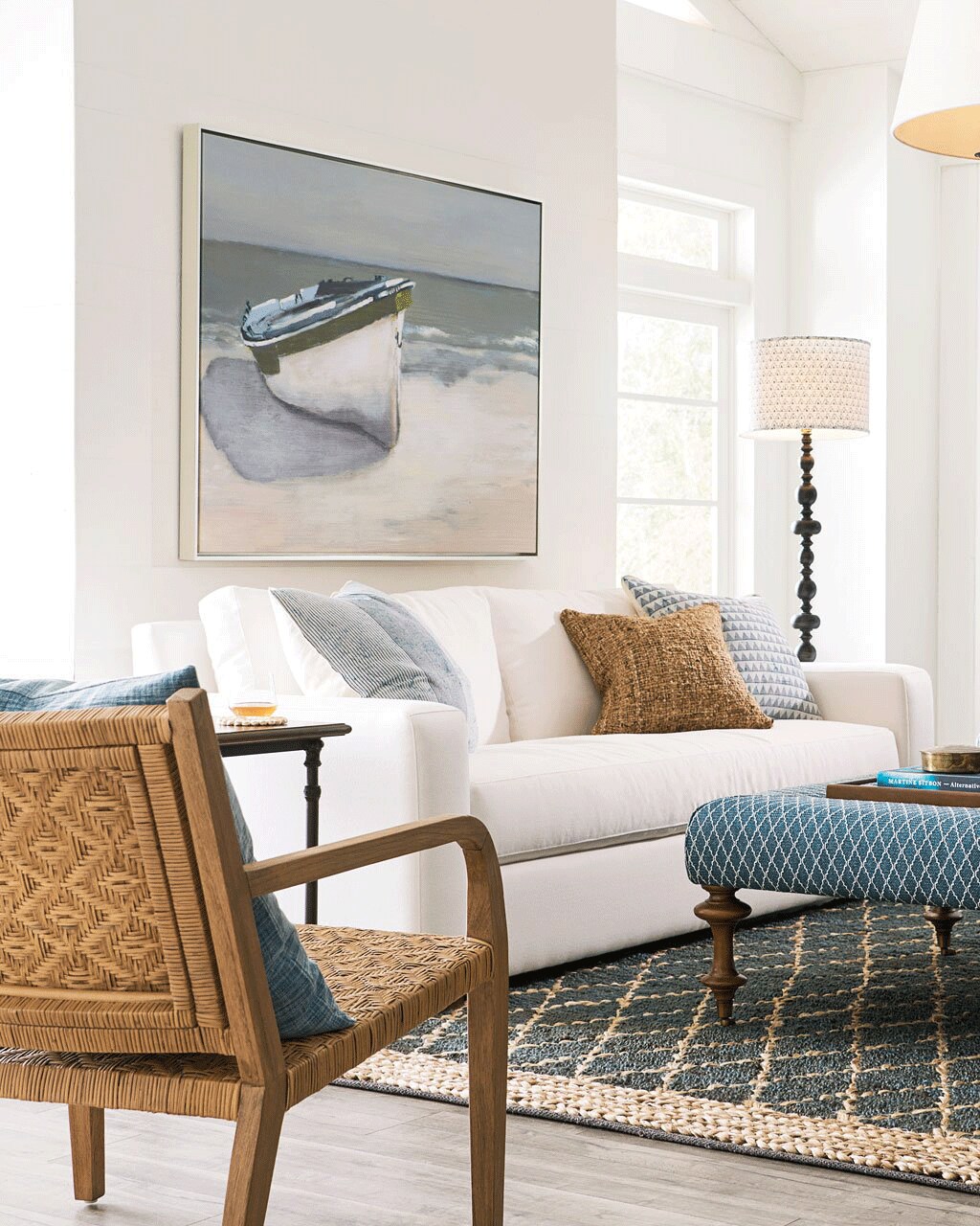 Hang one large painting over a sofa