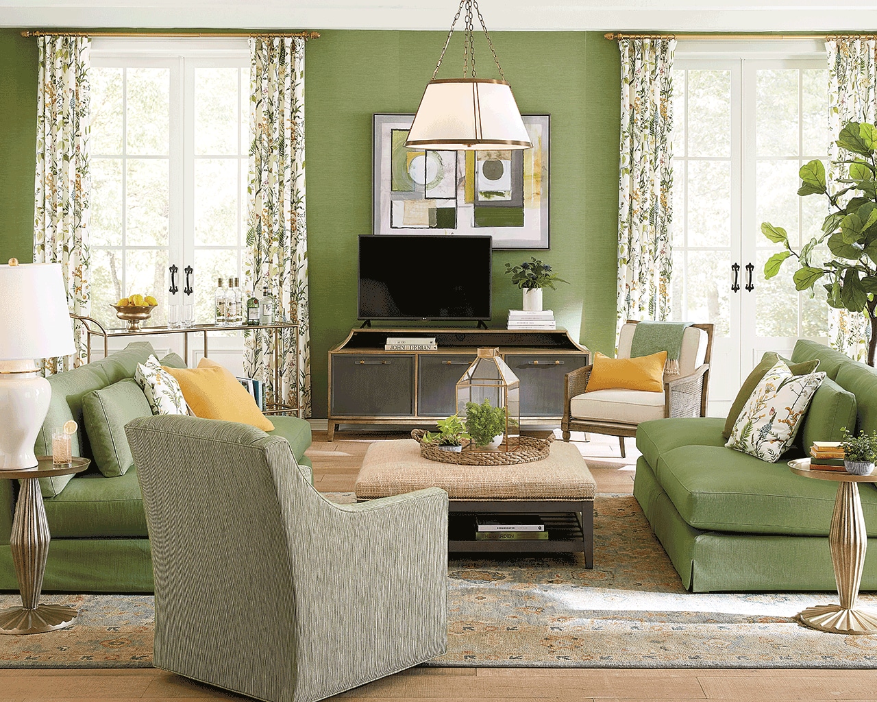 Living room with green parallel sofas in performance fabric