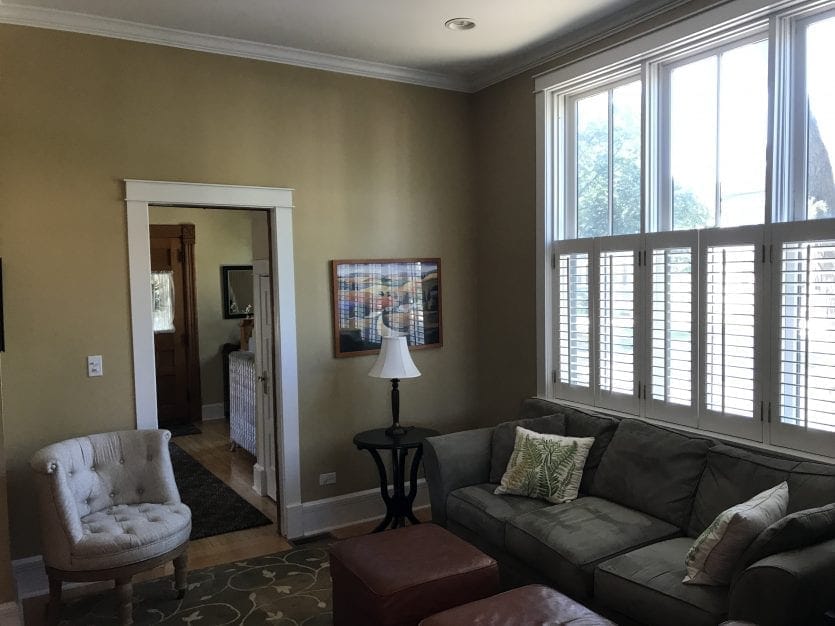 Family room with sage green walls