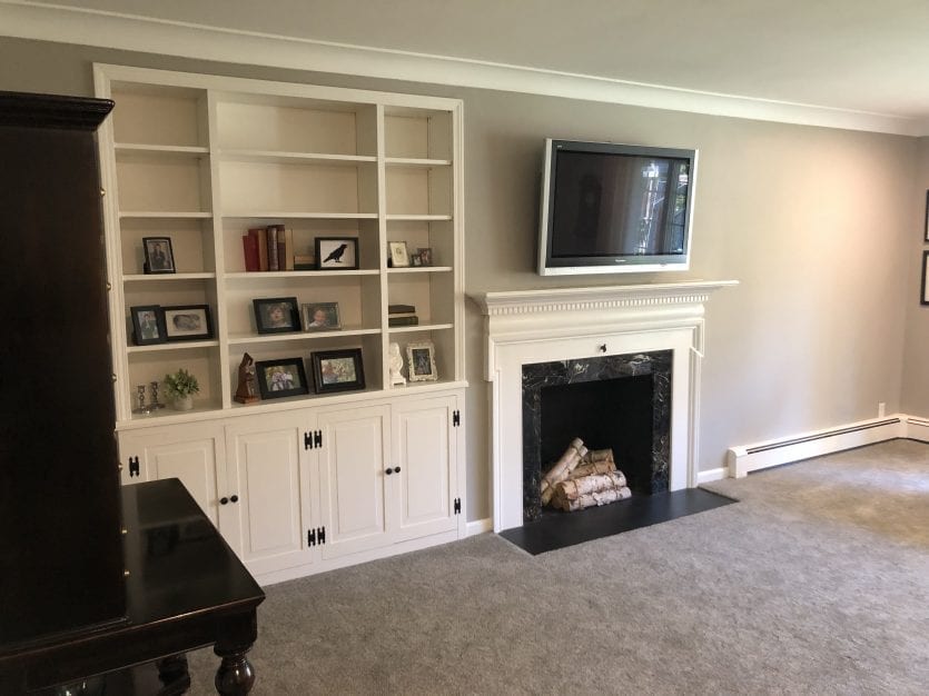 Gray family room with built in shelves