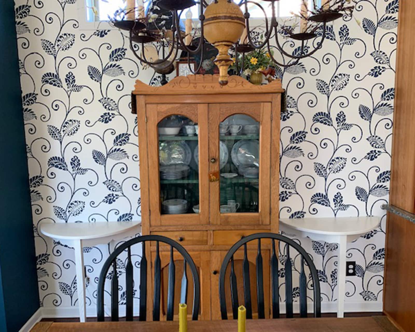 Brenda's open dining room with blue and white wallpaper