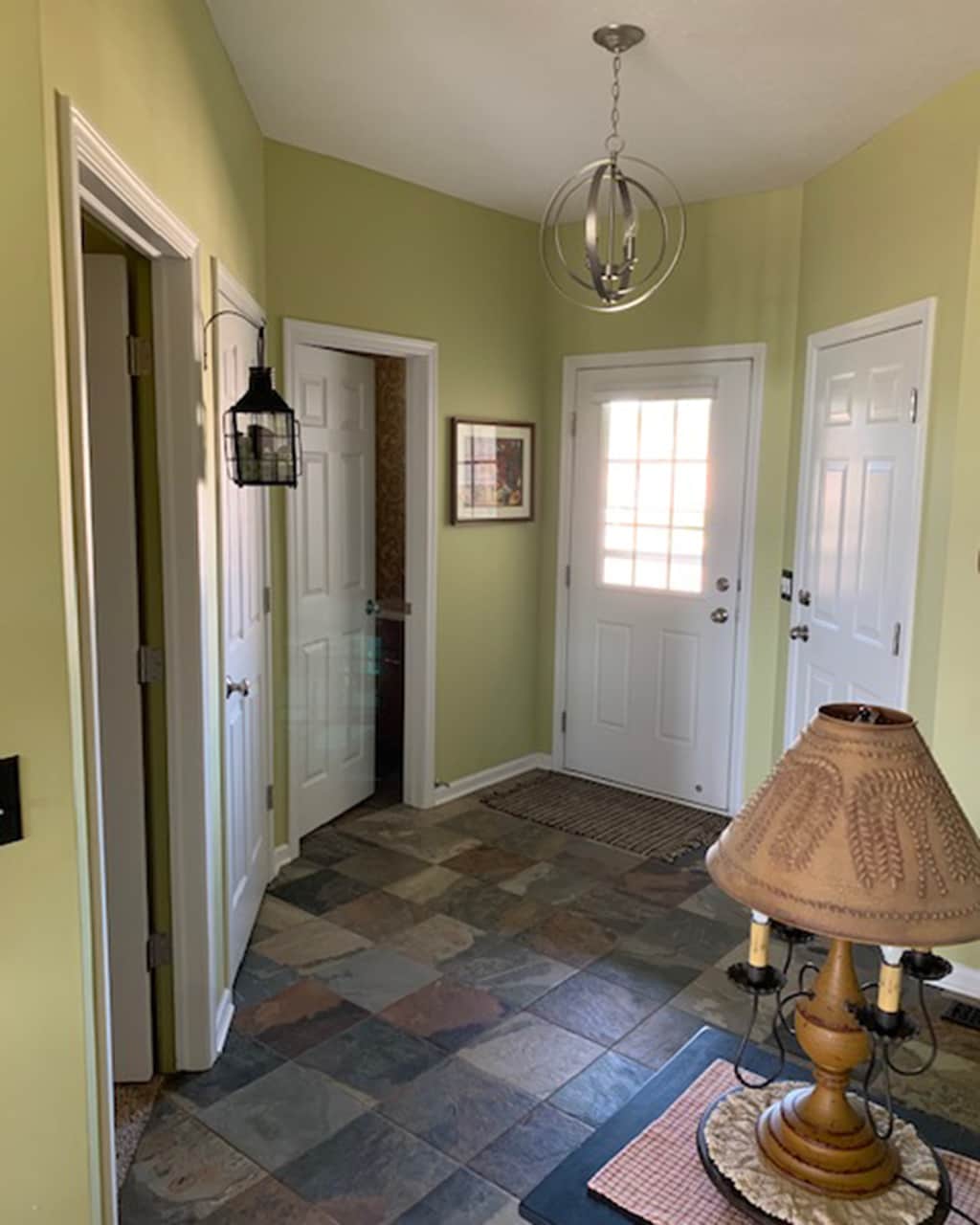 Brenda's citron green entryway with slate tile floors
