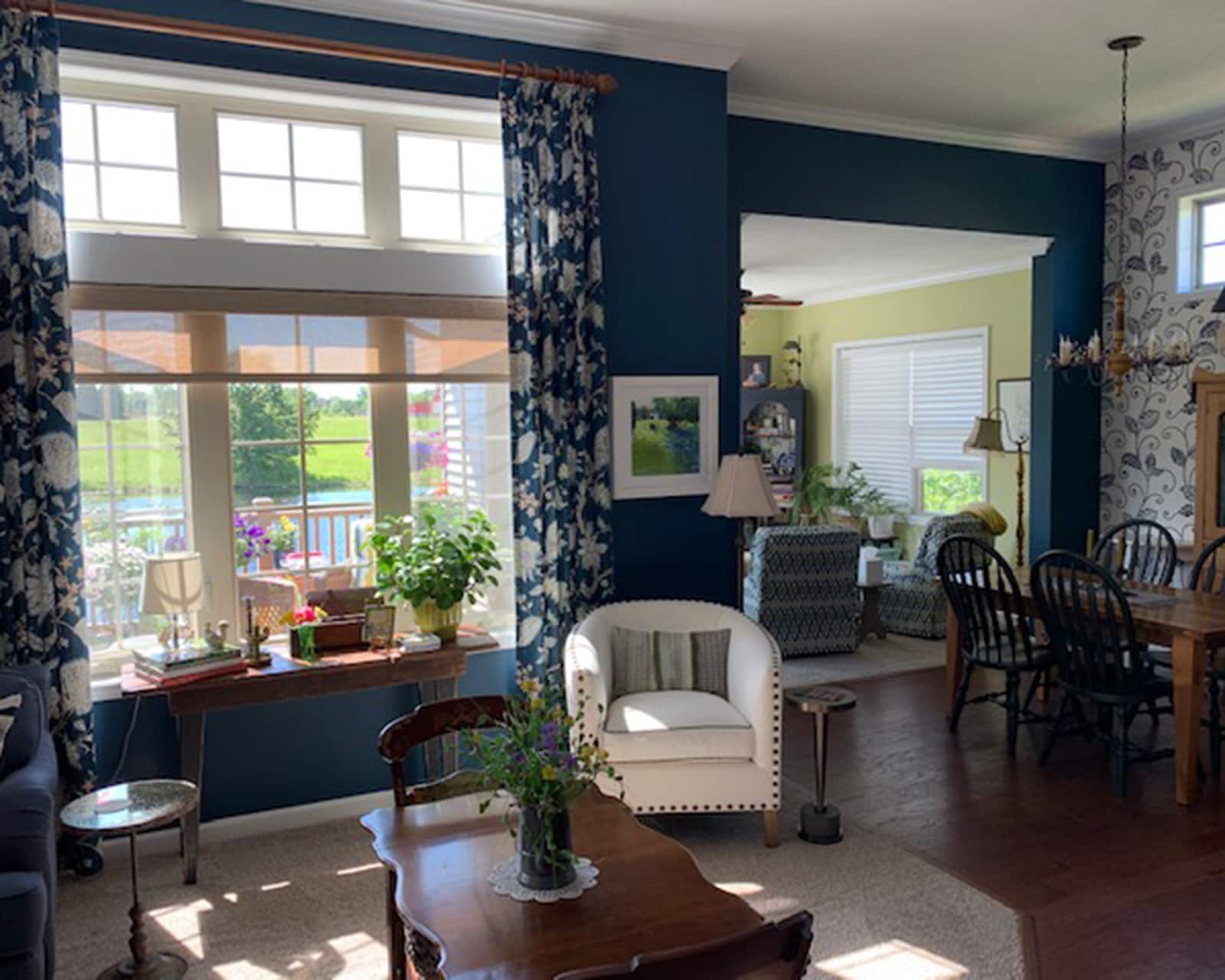 Dark blue walls in Brenda's sunny living room