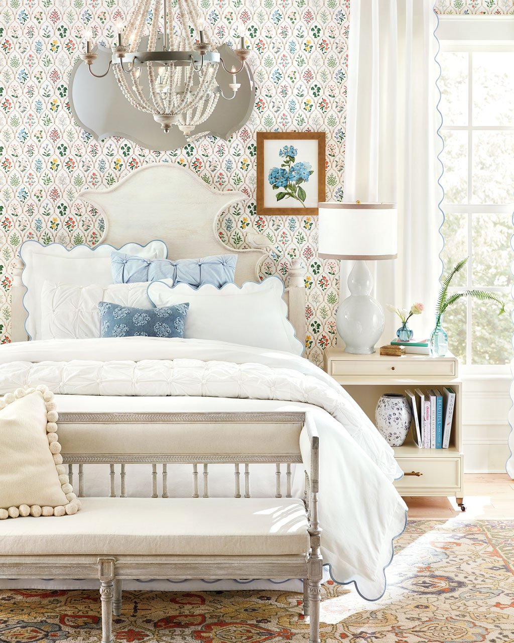 Floral wallpaper in white bedroom is a great way to add color
